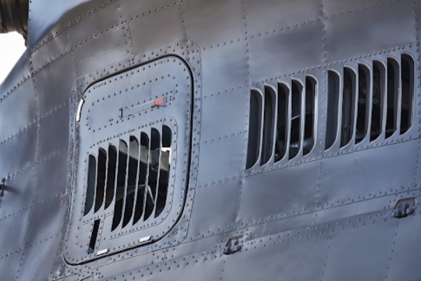 A close-up of a helicopter fuselage.